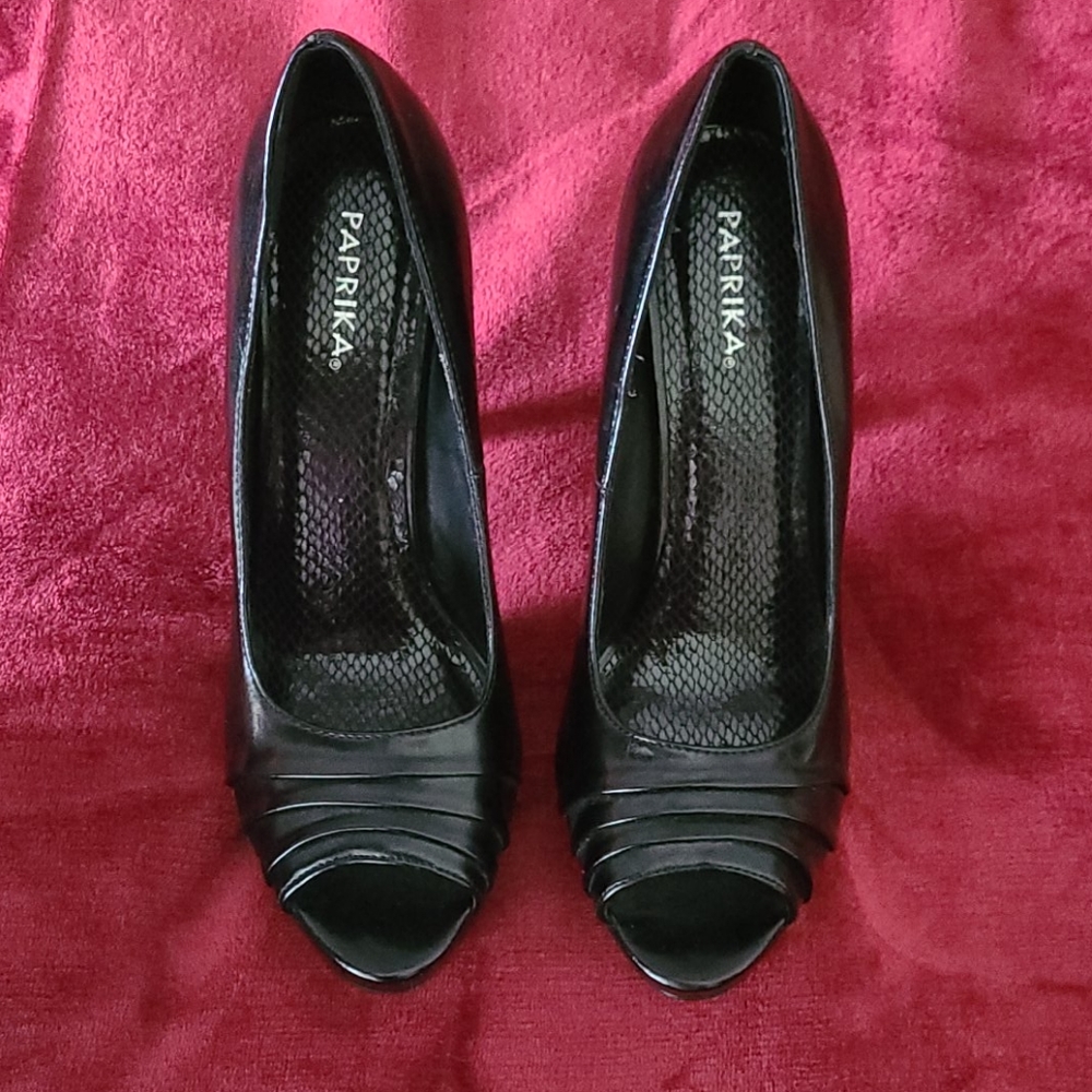 Black Peep Toe heel. Worn once.